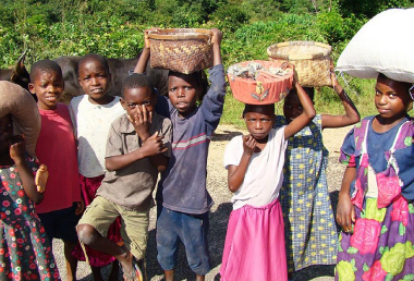 children carrying baskets